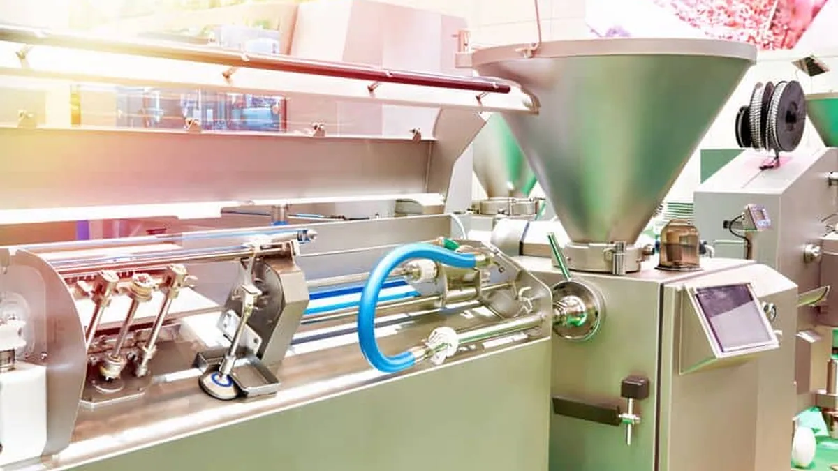Stainless dosing equipment with blue tubing and touch control panel