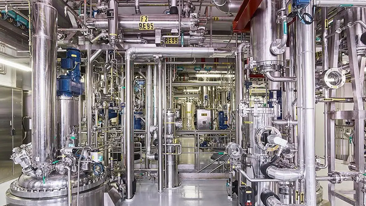Stainless process piping, tanks and instrumentation inside a treatment plant